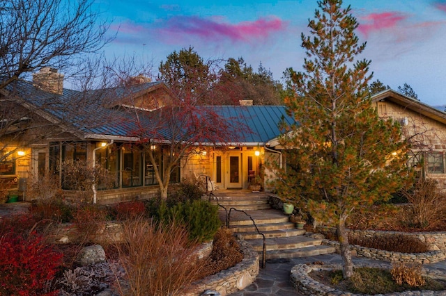 27744 Lee Rd, Mcarthur, CA 96056 - view of front facade with metal roof, a standing seam roof, and a chimney
