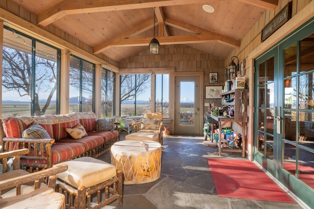 sunroom with wooden ceiling and lofted ceiling with beams