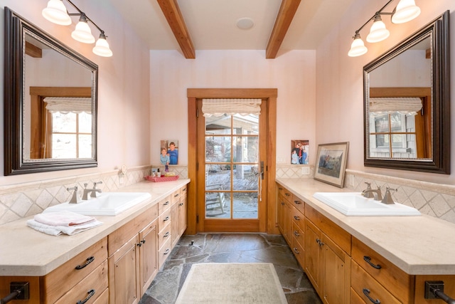 bathroom featuring backsplash, beamed ceiling, tile patterned floors, and vanity