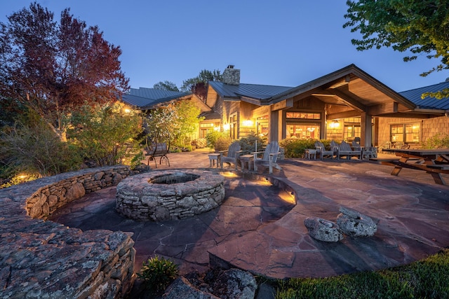 27744 Lee Rd, Mcarthur, CA 96056 - view of patio with an outdoor fire pit