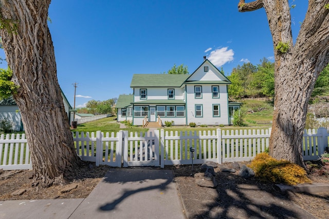 27744 Lee Rd, Mcarthur, CA 96056 - victorian house featuring a front lawn and a fenced front yard