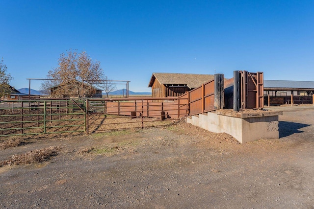 27744 Lee Rd, Mcarthur, CA 96056 - view of yard featuring an outbuilding and an exterior structure
