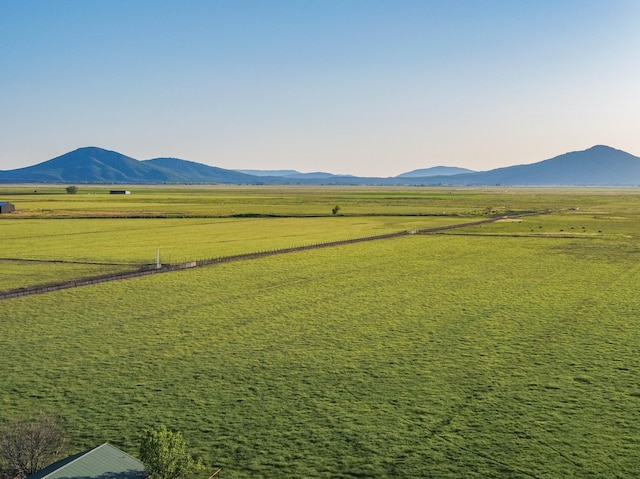 view of mountain feature with a rural view