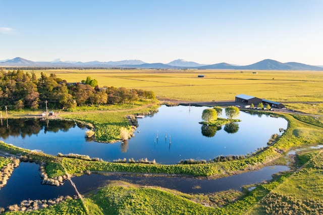27744 Lee Rd, Mcarthur, CA 96056 - drone / aerial view featuring a water and mountain view