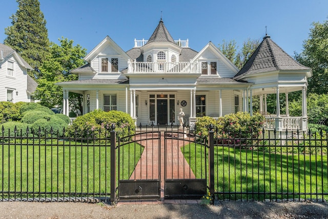 victorian-style house with covered porch