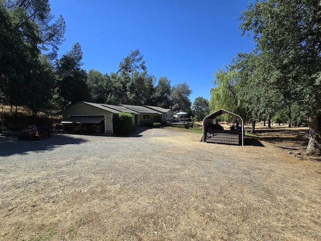 view of yard with a garage