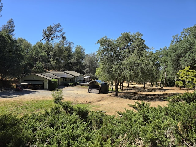 view of yard with a garage