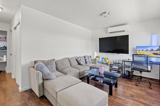 living room with an AC wall unit and dark hardwood / wood-style flooring