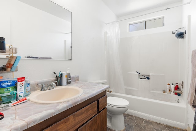 full bathroom featuring toilet, vanity, and shower / bathtub combination with curtain