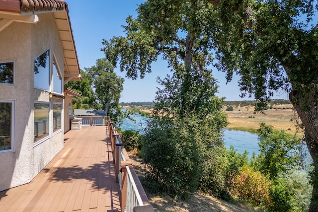 exterior space with a water view