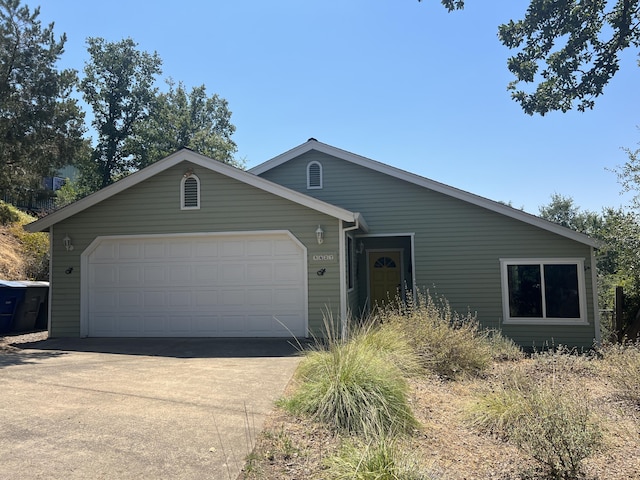 ranch-style home with a garage