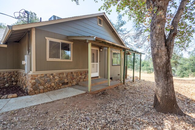 view of front facade featuring stone siding