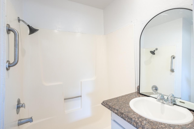 bathroom with shower / tub combination and vanity