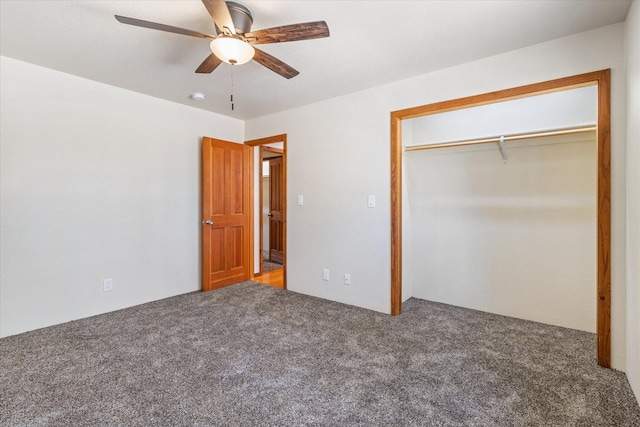 unfurnished bedroom featuring carpet, ceiling fan, and a closet