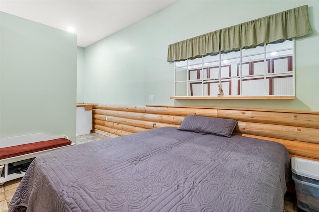 bedroom featuring tile patterned floors