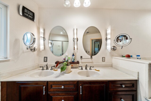 bathroom featuring double vanity