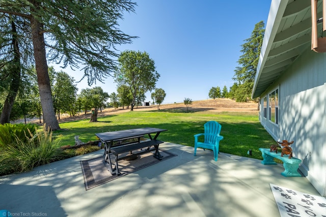 view of patio featuring outdoor dining area