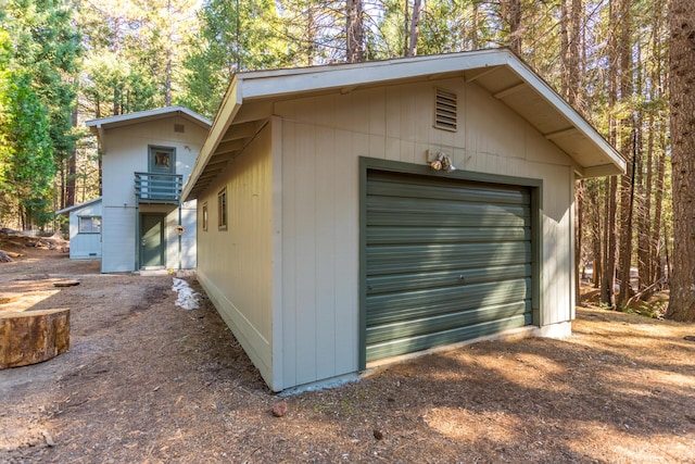 view of outbuilding with a garage