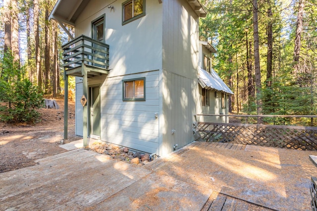 view of home's exterior featuring a balcony