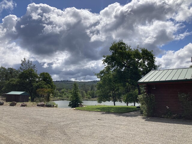 view of yard with a water view