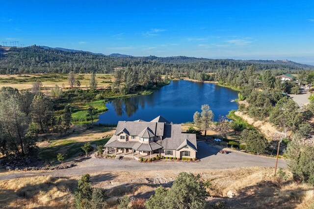 bird's eye view with a water and mountain view