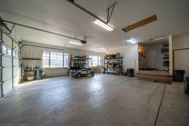 garage featuring a garage door opener