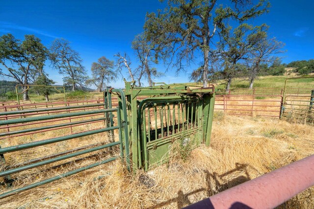 exterior space with a rural view