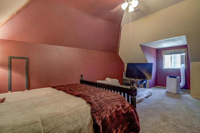 bedroom with ceiling fan, carpet, and lofted ceiling