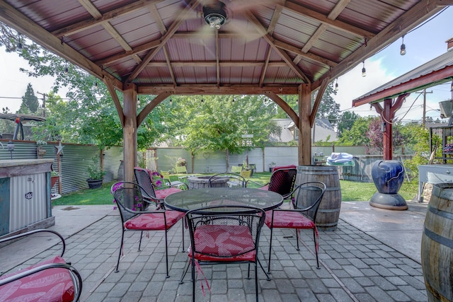 view of patio / terrace with a gazebo and ceiling fan