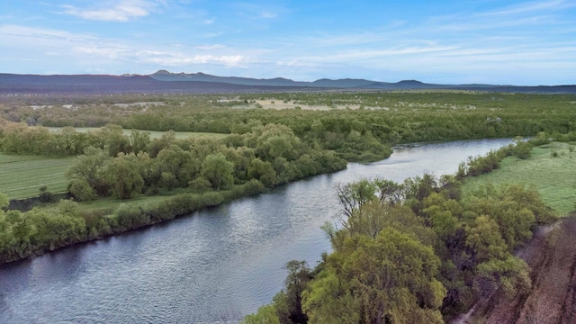 aerial view with a water and mountain view