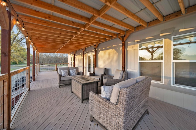 wooden terrace featuring outdoor lounge area