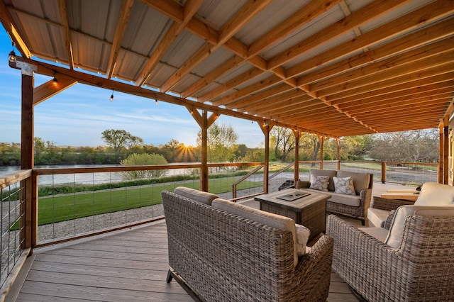 wooden deck with an outdoor living space