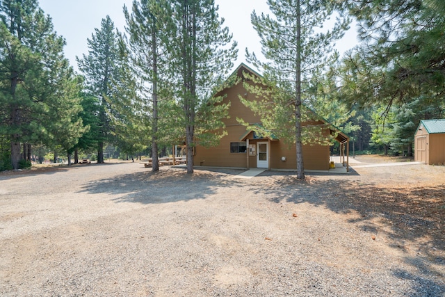 exterior space with an outdoor structure and a storage unit