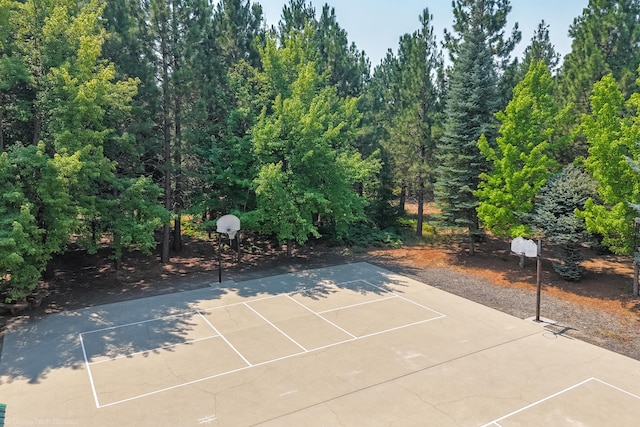 view of basketball court with a tennis court and community basketball court