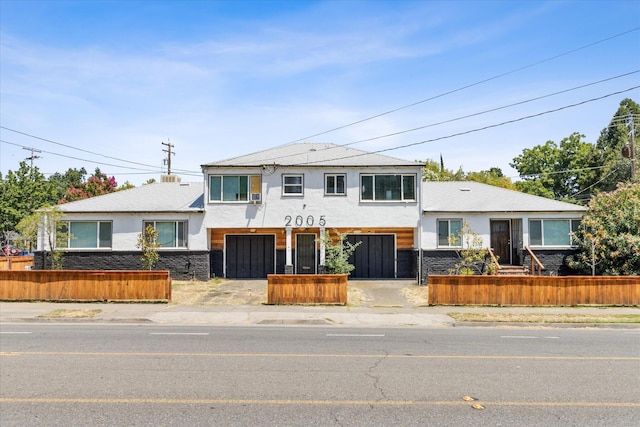 split level home with a garage