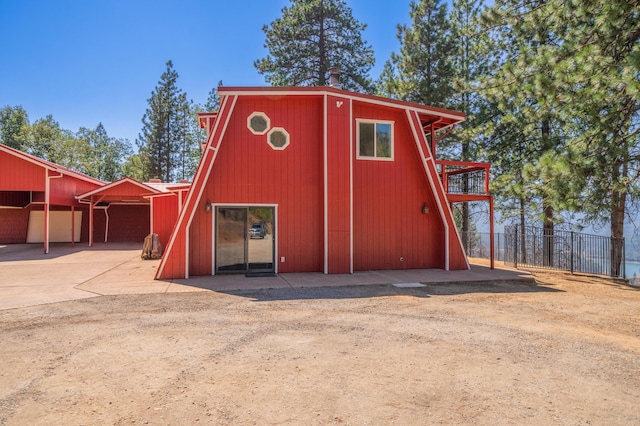 view of outdoor structure with a carport