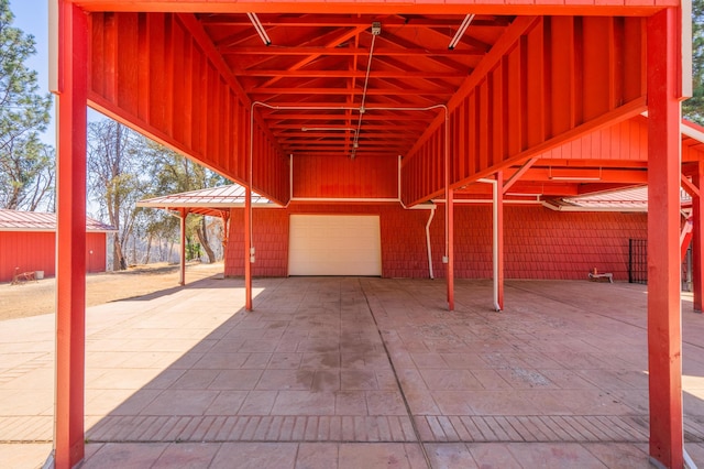 view of patio featuring an outdoor structure