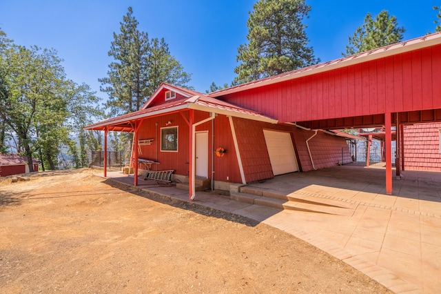 exterior space featuring dirt driveway