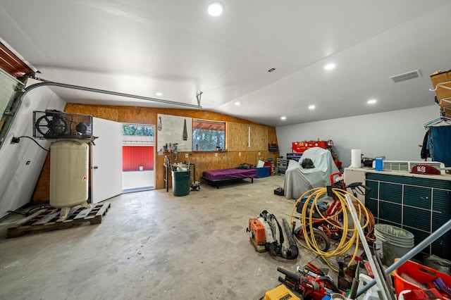 garage with recessed lighting and visible vents