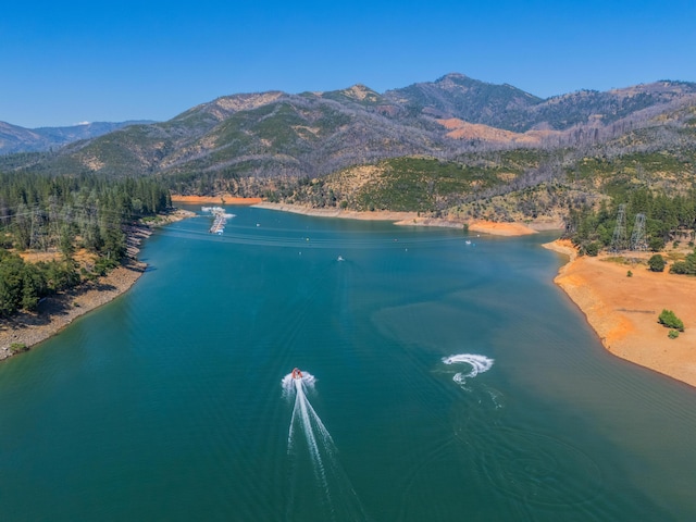 bird's eye view featuring a water and mountain view