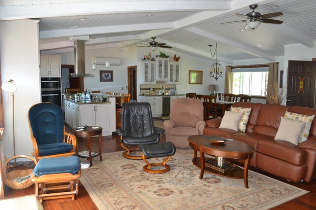 living room featuring ceiling fan, vaulted ceiling with beams, and hardwood / wood-style flooring