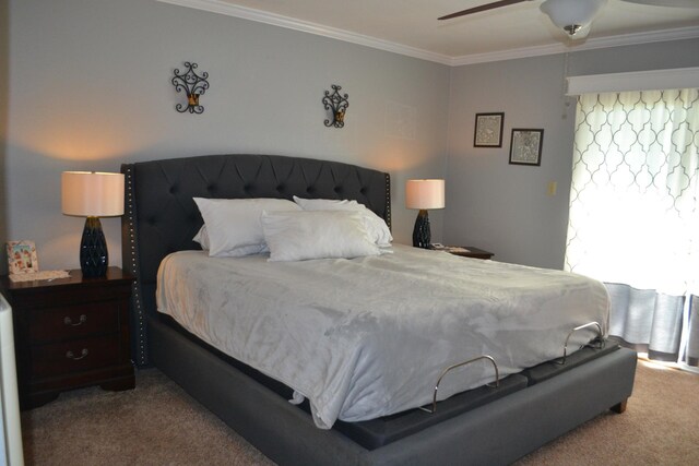 bedroom with ceiling fan, crown molding, and carpet flooring