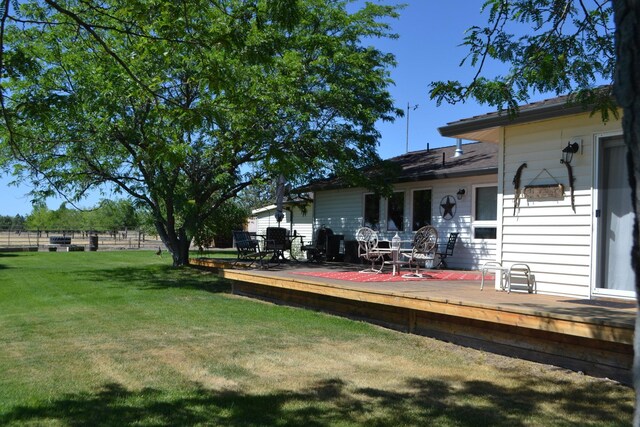 view of yard with a deck