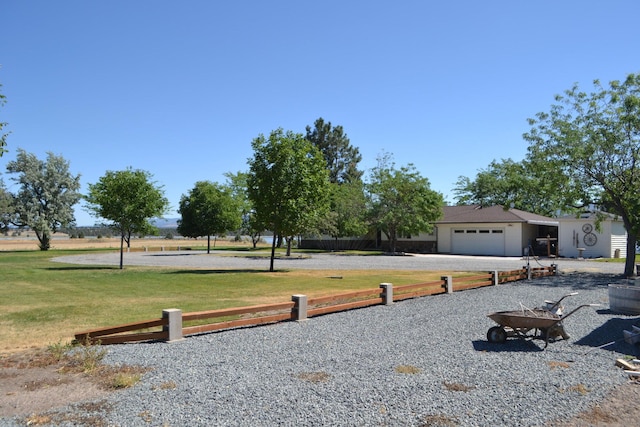 view of yard with a garage