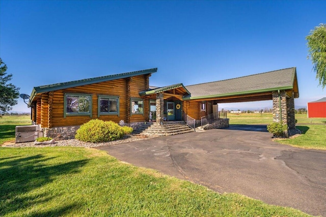 log home with a front lawn