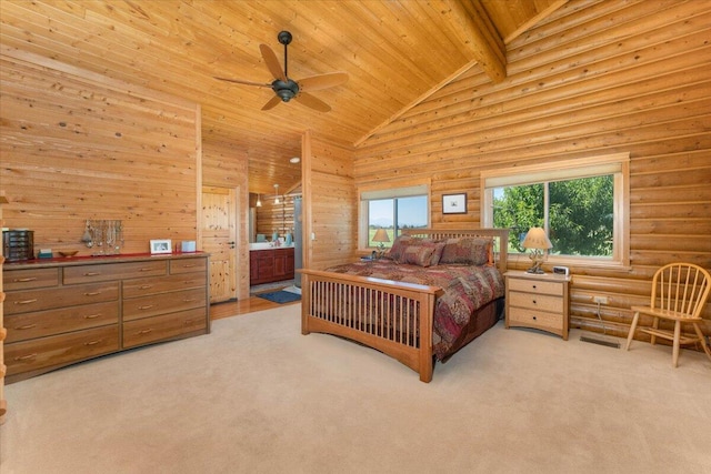 carpeted bedroom with ensuite bath, high vaulted ceiling, log walls, wooden ceiling, and beamed ceiling