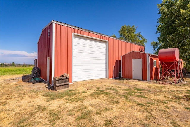 garage with a lawn