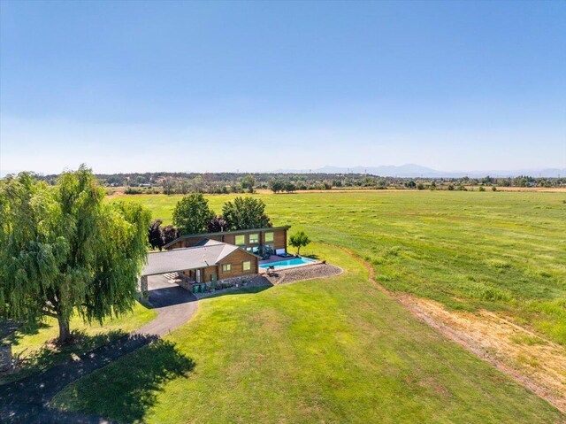 birds eye view of property featuring a rural view