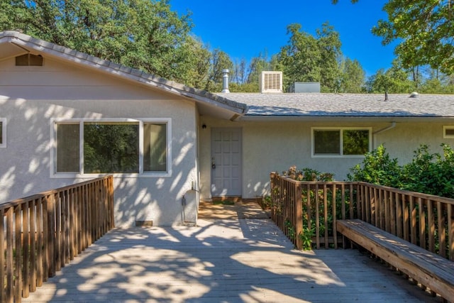 view of front of property with a deck