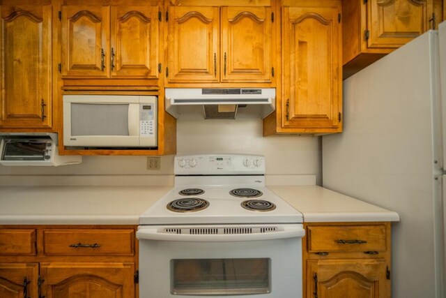 kitchen featuring white appliances